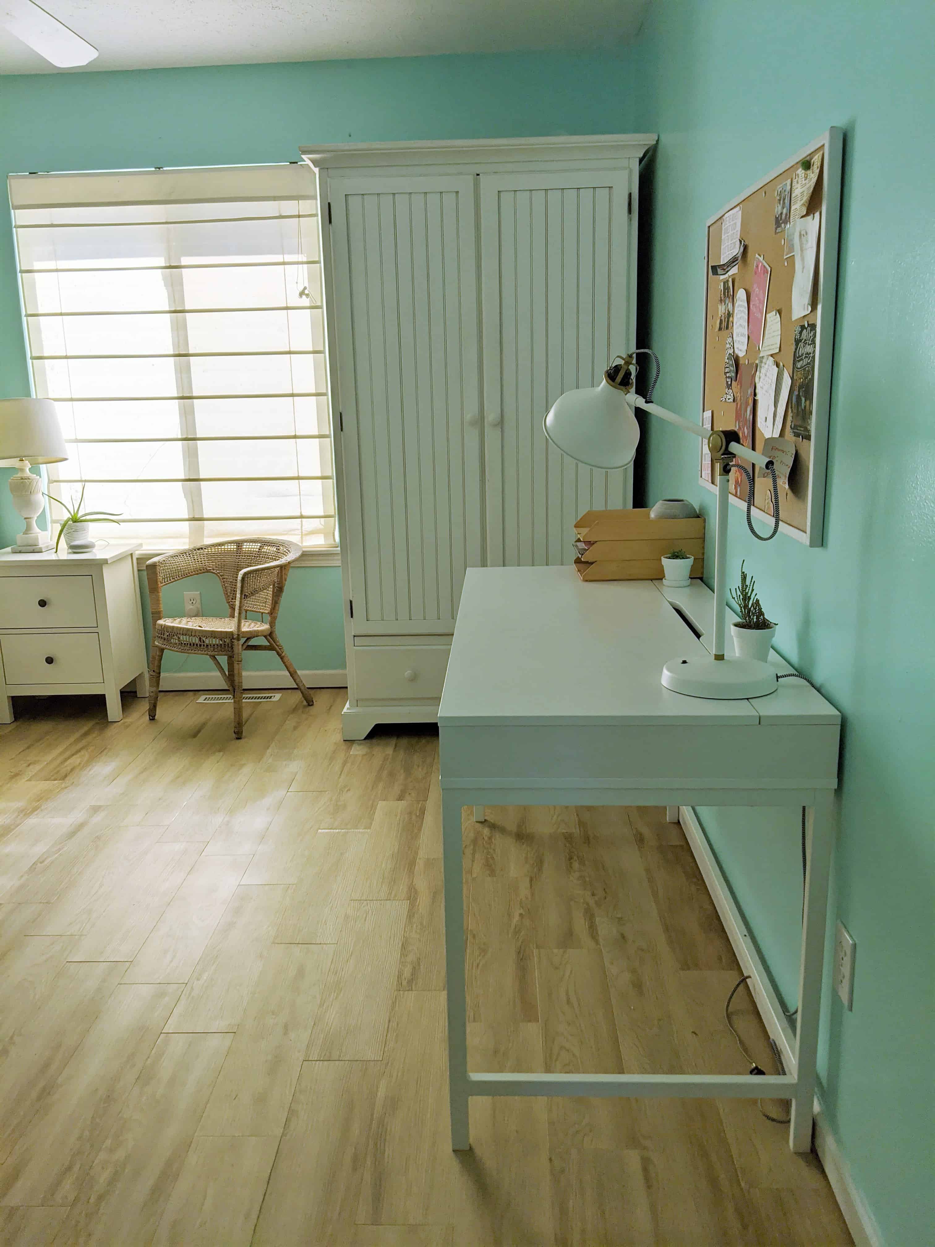 blue girls room with white furniture