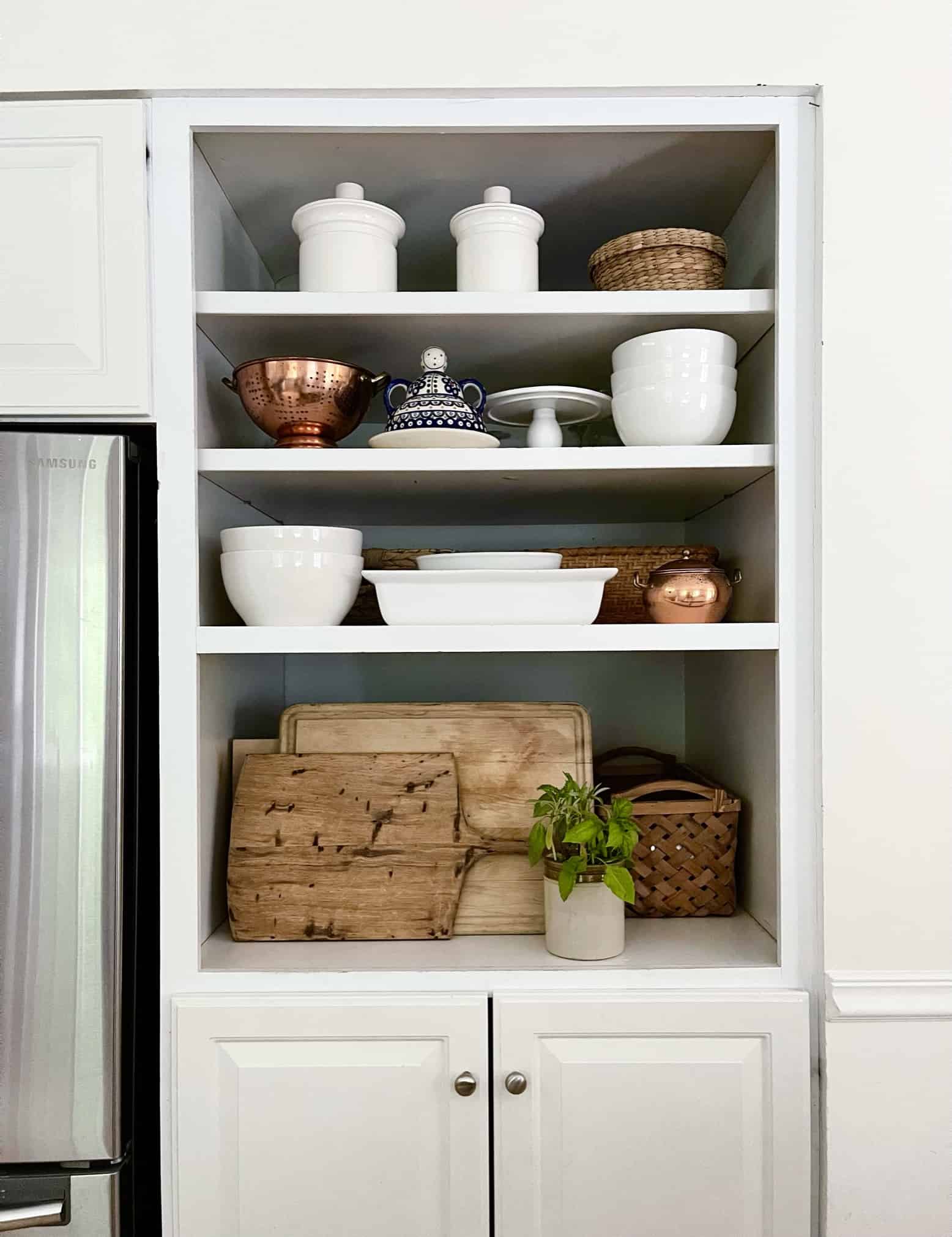 open shelving in country kitchen