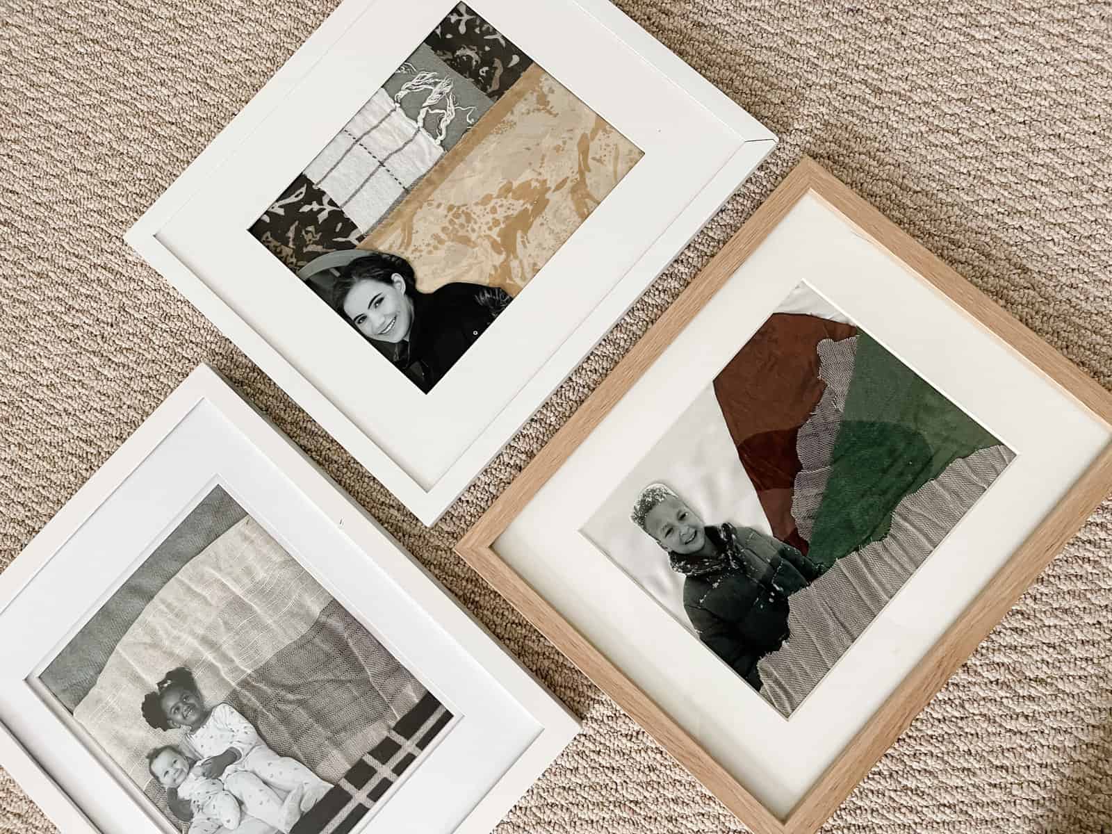 Three picture frames with black and white family photos.