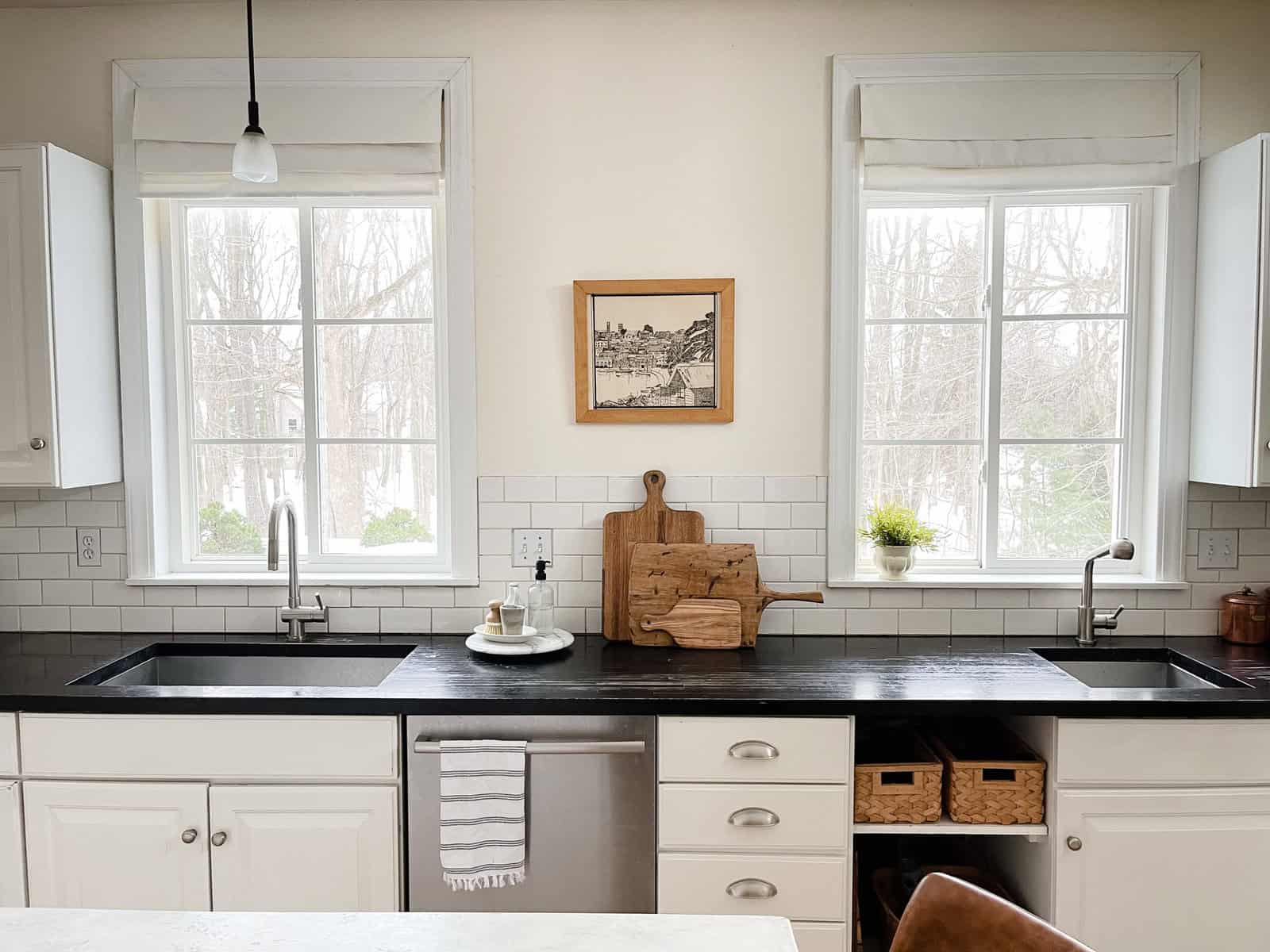 A classic white kitchen with black counters