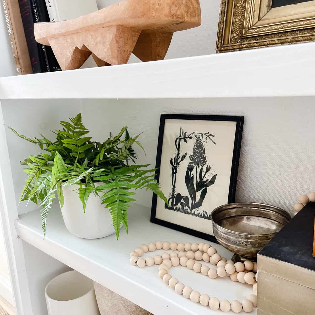 styled bookshelf with home decor accents