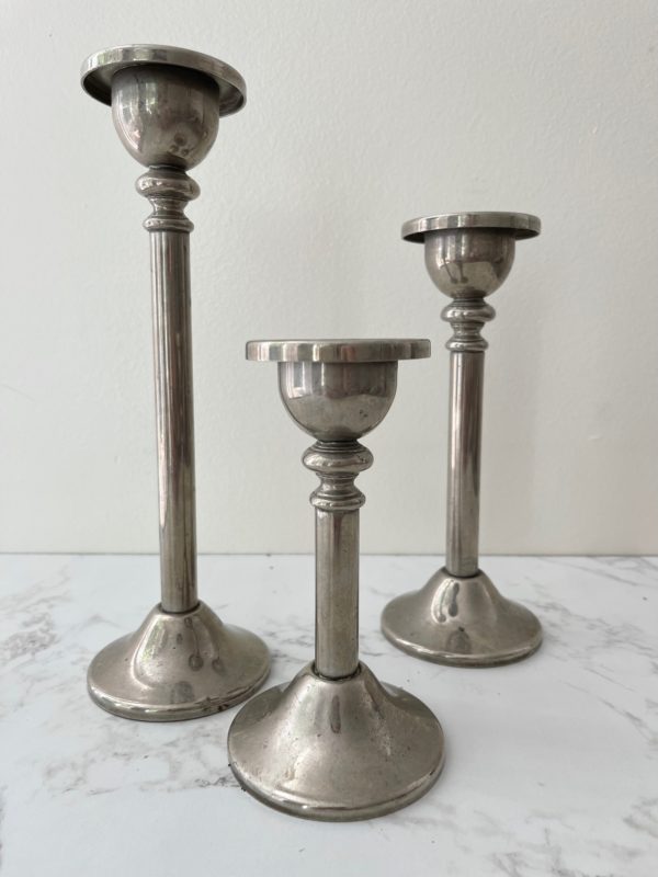 set of three silver plated candle sticks