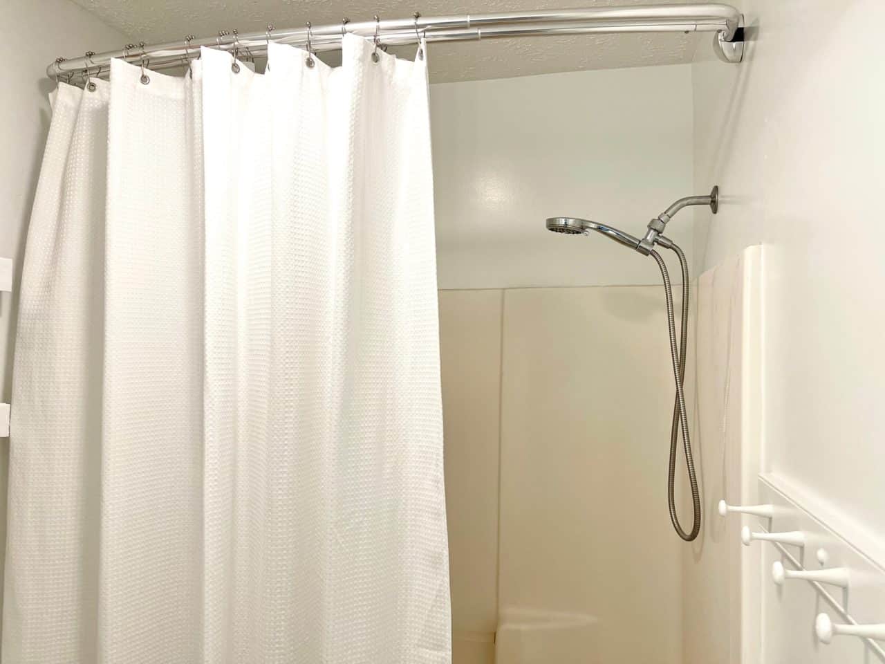 Replacing a Dated Glass Shower Door with a Double Rod and Curtains ...