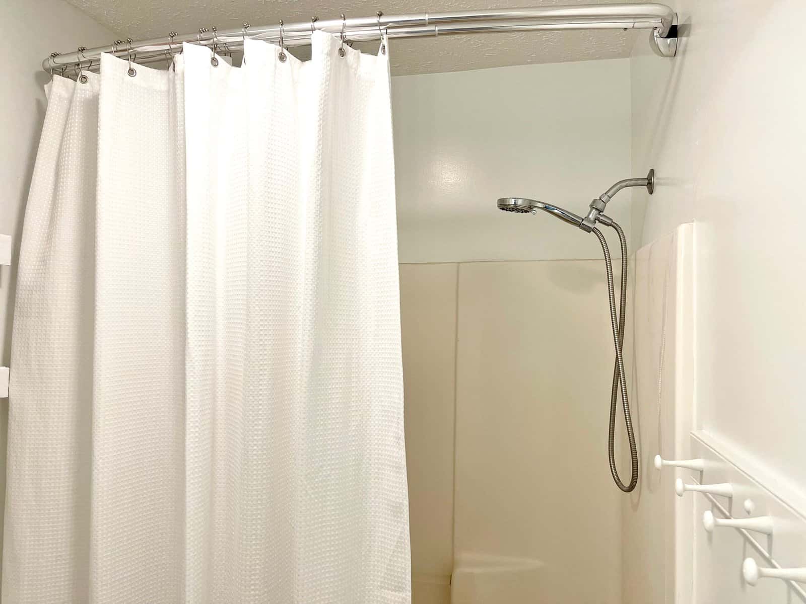 replacing shower glass door curved rod